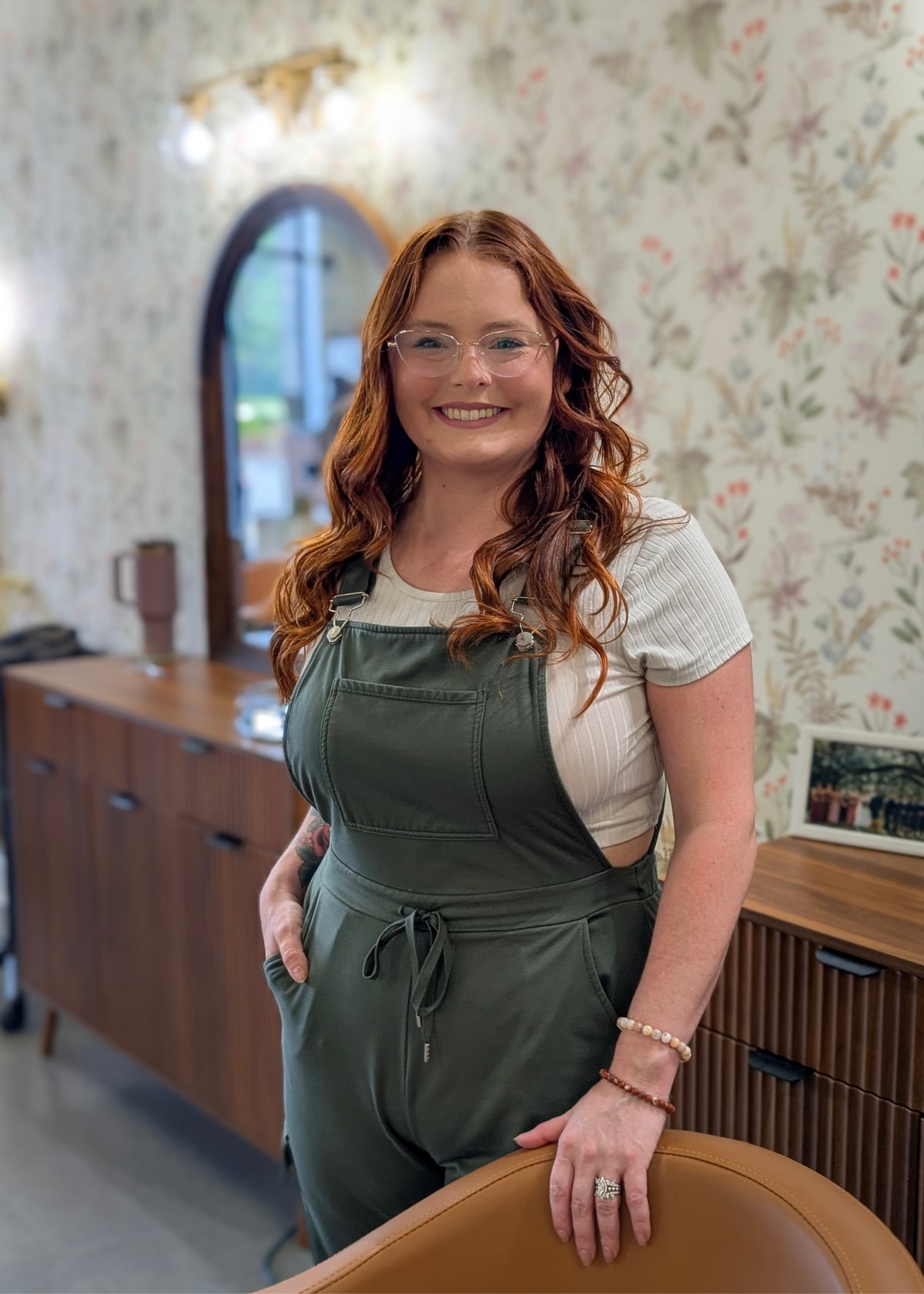 Christine, master stylist, standing in the In Vision Hair Design salon